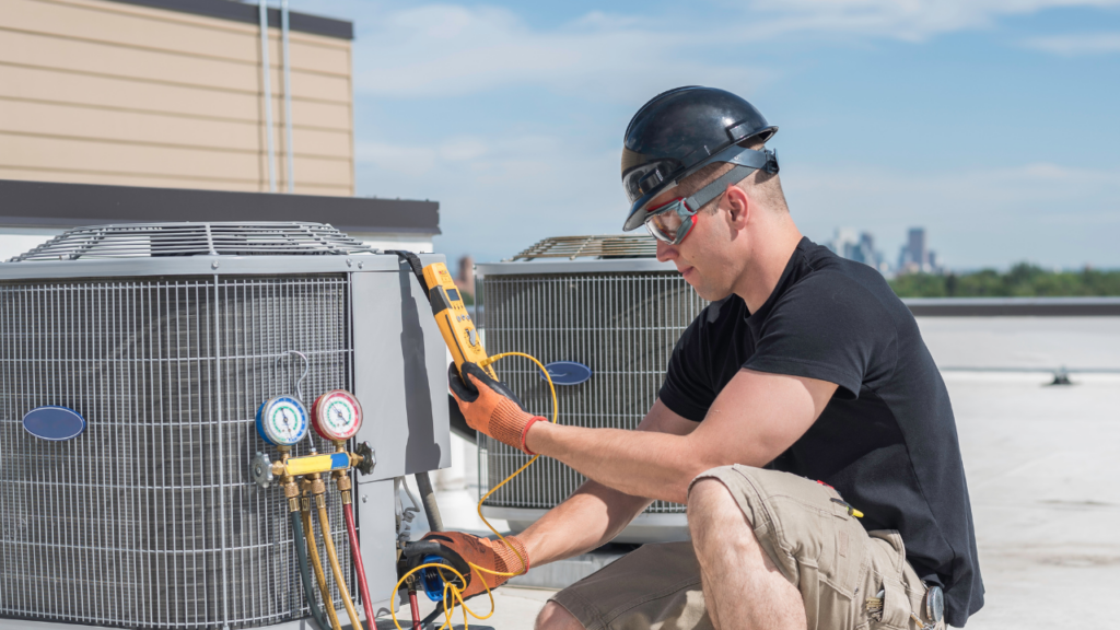 man repairing hvac