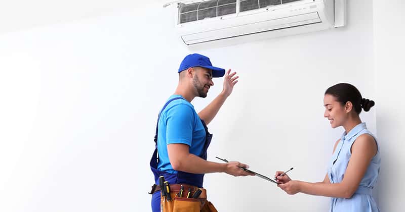 HVAC in Aubrey, TX 17 hvac tech with happy customer